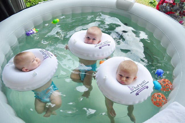 baby floating in water